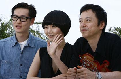 Japanese actor Arata, actress Bae Doo-Na and actor Itao Itsuji (from L to R) pose during a photocall for the flim Kuki Ningyo (Air Doll) at the 62nd Cannes Film Festival on May 14, 2009. (Xinhua Photo)