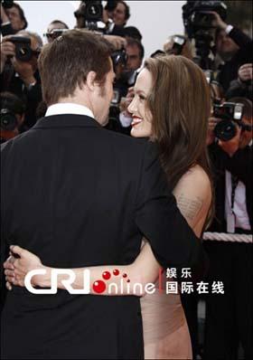 Cast member Brad Pitt and Angelina Jolie arrive for the screening of the movie "Inglourious Basterds" in competition at the 62nd Cannes Film Festival on May 20, 2009. [Photo: Getty Image/CFP]