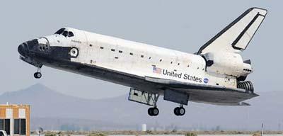 Space Shuttle Atlantis lands in the Mojave Desert at the NASA Dryden Flight Research Center on Edwards Air Force Base near Mojave, California. The space shuttle Atlantis touched down at its alternative landing spot in California Sunday after a successful mission to repair and upgrade the Hubble Telescope. (Xinhua/AFP Photo)