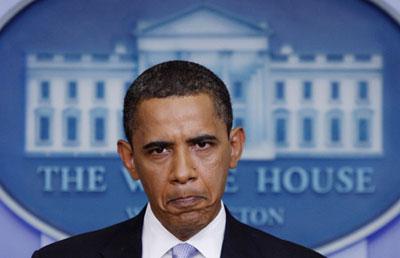 U.S. President Barack Obama listens to questions during a news conference in the Brady Press Briefing Room of the White House in Washington, June 23, 2009.(Xinhua/Reuters Photo)