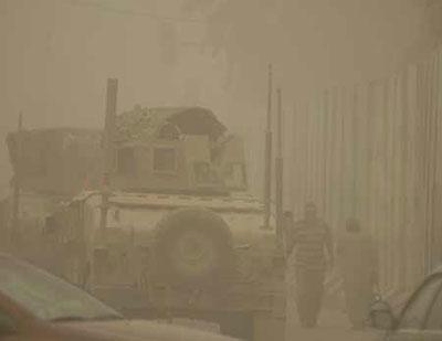 A military vehicle runs in the street of Baghdad, capital of Iraq, on June 28, 2009. As the deadline, June 30, for the U.S. troops to withdraw from Iraqi cities is approaching, bomb attacks frequent these days in Baghdad. The U.S.-Iraqi troops raised the security alert level here to assure the stability here for U.S. troops to withdraw smoothly. (Xinhua/Gao Shan)