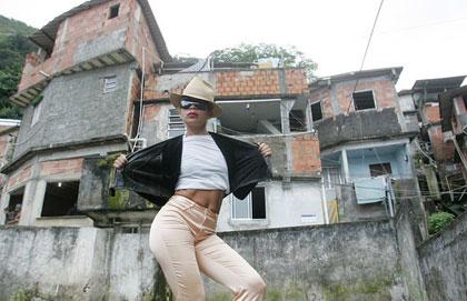 Michael Jackson fan Antonia Carlos Gomes, dances on the roof at the slum of Santa Marta, where Jackson filmed the Spike Lee-directed video 