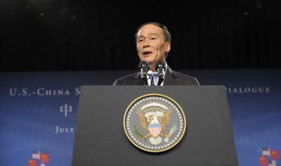 Chinese Vice Premier Wang Qishan delivers a speech during the opening ceremony of the China-U.S. Strategic and Economic Dialogue (S&ED) in Washington, the United States, July 27, 2009.  (Xinhua/Zhang Yan)