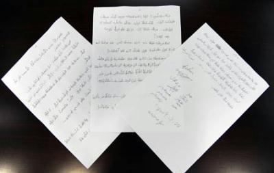 The photo taken on Aug. 2, 2009 shows a letter written by family members of Rebiya Kadeer to relatives of the victims in the riot in Urumqi on July 5. Family members of Rebiya Kadeer have asked her not to organize violence or undermine the peaceful life in Xinjiang, in letters made public on Monday. (Xinhua/Ding Lin)