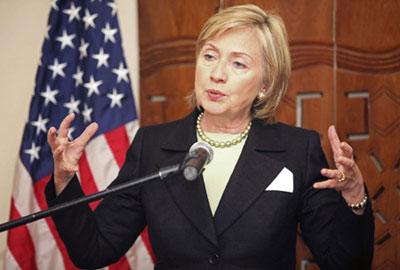 U.S. Secretary of State Hillary Clinton speaks to the media during a visit to the Foreign Minister's Residence in Abuja August 12, 2009.(Xinhua/Reuters Photo)