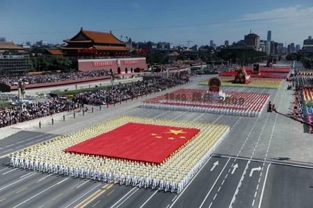 The phalanx of national flag receives inspection in a parade of the celebrations for the 60th anniversary of the founding of the People's Republic of China, on Chang'an Street in central Beijing, capital of China, Oct. 1, 2009. (Xinhua/Yang Lei)