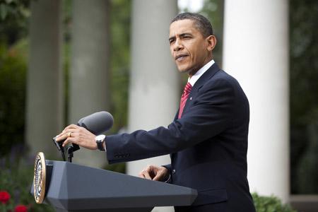 U.S. President Barack Obama makes a statement on the economy and the awarding of the 2016 Olympic Games to Rio de Janeiro in the Rose Garden of the White House in Washington, October 2, 2009.(Xinhua/Reuters File Photo)