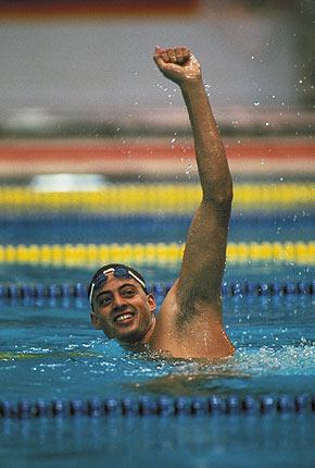 Seoul, Chamshil, 24 September 1988: Matthew BIONDI, USA raises his fist in celebration after winning the men's 50m freestyle swimming event. BIONDI smashed the world record with a time of 22.14 secs. Credit : Getty Images/Simon Bruty
