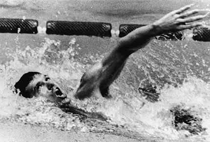 Mexico City, 23 October 1968: Michael BURTON of the United States, 1st, in action in the 400m freestyle swimming during the Games of the XIX Olympiad. Credit: IOC Olympic Museum Collections