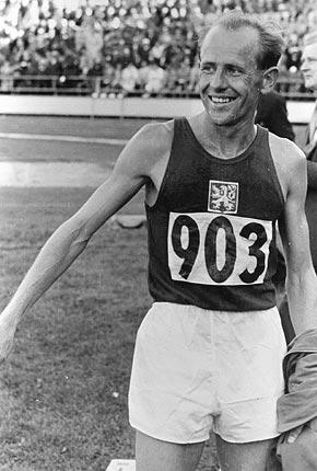 Helsinki, 1952. Games of the XV Olympiad. Men's Athletics. Emil ZATOPEK of Czechoslovakia: Triple gold medallist in the 5000m, 10000m and marathon events. Credit: IOC Olympic Museum Collections/Lothar R徂belt