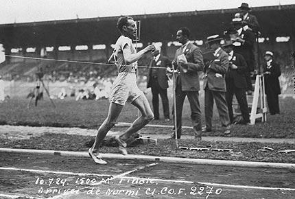 Paris, 1924, Games of the VIII Olympiad. Men's athletics, 1500m: winner Paavo NURMI at the finishing line. Credit : IOC Olympic Museum Collections