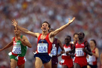 Barcelona, 8 August 1992, Games of the XXV Olympiad. Fermin CACHO RUIZ of Spain throws his arms in the air as he claims victory in the men's 1,500m final. He surprised everyone by winning in a time of 3:40.12 minutes in front of his home crowd. Credit: Getty Images/Bob Martin