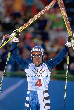 Nagano, 20 February 1998, XVIII Olympic Winter Games. Alpine skiing, women's giant slalom: Deborah COMPAGNONI of Italy, 1st, celebrates in the finishing area. Credit: Getty Images/WARSHAW Todd