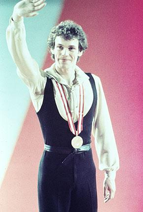 Innsbruck 1976, XII Olympic Winter Games. Men's figure skating. Gold medallist John CURRY of Great Britain on the podium. Credit: Getty Images/Tony Duffy
