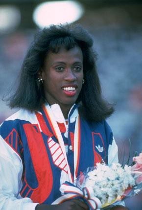 Seoul, 24 September 1988, Games of the XXIV Olympiad. Ceremony of medals presentation for the heptathlon: American gold medalist Jackie JOYNER-KERSEE on the podium. Credit : Getty Images