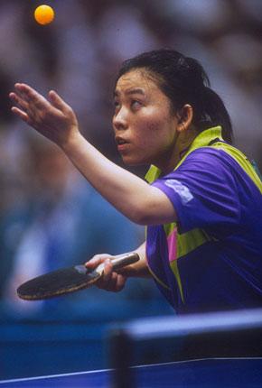 Atlanta, Georgia World Congress Center, 31 July 1996, Games of the XXVI Olympiad: Yaping DENG of China in action during the table tennis final against Jing CHEN of Chinese Taipei. Yaping DENG went on to win the gold medal. Credit: Getty Images/Rick Stewart