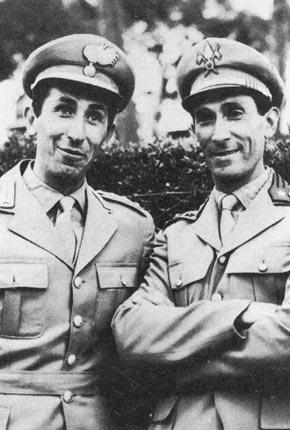 Stockholm, June 1956, Equestrian Games of the XVI Olympiad. Italian riders Raimondo D'INZEO (left) and his brother Piero pose for photographs. They won silver and bronze respectively in the individual jumping event. They also won silver in the team event. Credit: IOC / Olympic Museum Collections