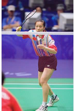 Sydney, Olympic Park, Pavilion 3, 20 September 2000, Games of the XXVII Olympiad: Fei GE of China in action in the women's badminton doubles quarterfinals against Indonesia. Fei GE and her teammate Jun GU went on to win the gold medal.