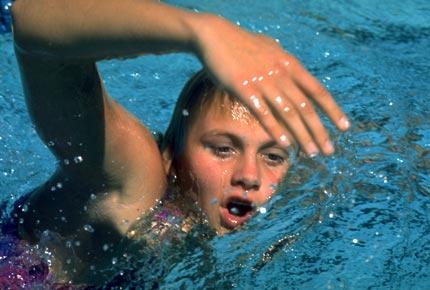 The young Australian swimmer Shane GOULD is photographed at a training session in 1971. She won three gold medals (200m freestyle, 400m freestyle and 200m medley), one silver medal (800m freestyle) and one bronze medal (100m freestyle) at the Games of the XX Olympiad Munich 1972. Credit: Getty Images/Tony Duffy