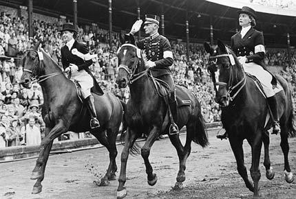 Stockholm, 16 June 1956: the medallists of the equestrian individual dressage: Lis HARTEL from Denmark on Jubilee, 2nd, Henri SAINT CYR from Sweden on July, 1st, and Liselott LINSENHOFF from Germany on Adular, 3rd. Credit: IOC Olympic Museum Collections