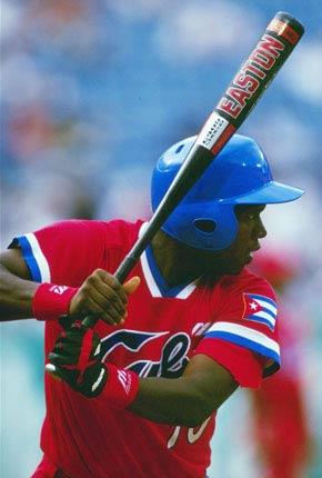 Atlanta, Fulton County Stadium, 20 July 1996, Games of the XXVI Olympiad: Oscar LINARES of Cuba in action during the Cuba-Australia (2-5) baseball match during the preliminaries. Cuba went on to win the gold medal. Credit: Getty Images/Rick Stewart