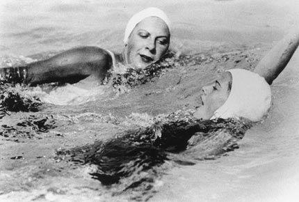 Los Angeles, August 1932: Americans Helene MADISON - gold medalist in the swimming 100m freestyle, 400m freestyle and 4x100m freestyle - and Eleanor HOLM - winner of the 100m backstroke - during the Games of the X Olympiad. Credit: IOC Olympic Museum Collections