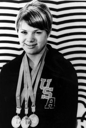 Mexico City, October 1968, Games of the XIX Olympiad. Portrait of American swimmer Deborah MEYER wearing the three gold medals she won in the 200m, 400m and 800m events. Credit: IOC Olympic Museum Collections