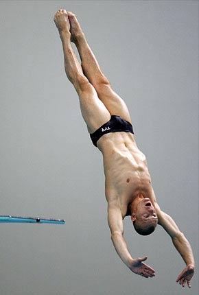 Athens, 24 August 2004, Games of the XXVIII Olympiad. Aquatics, men's diving: Dmitri SAUTIN of Russia competes in the springboard individual semifinal event at the Olympic Aquatic Centre. Credit: Getty Images/Daniel Berehulak