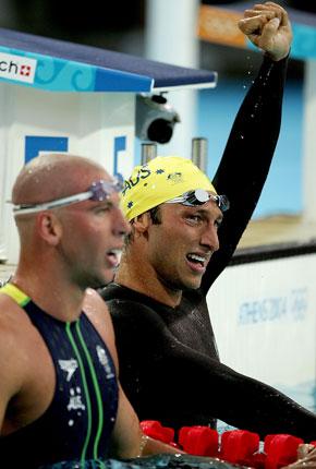 Athens, 14 August 2004, Games of the XXVIII Olympiad. Men's swimming: Ian THORPE of Australia (R) celebrates winning gold in the 400m freestyle final ahead of fellow countryman Grant HACKETT (L) at the Main Pool of the Olympic Sports Complex Aquatic Centre. Credit : Getty Images/Al Bello