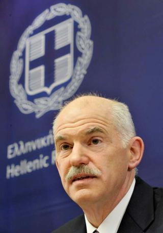 Greece's Prime Minister George Papandreou talks to the media after the informal summit of the European Union (EU) in Brussels, capital of Belgium, Feb. 11, 2010. The first EU summit called by the bloc's first full-time President Herman Van Rompuy concluded here on Thursday afternoon, showing clear political support for debt-laden Greece. (Xinhua/Thierry Monasse)