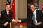 2009<br>Le président chinois rencontre son homologue américain Barak Obama à Londres