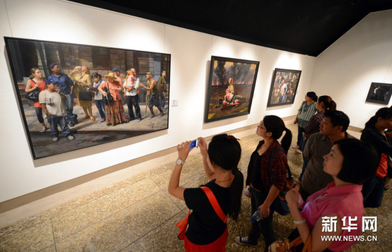 9月14日，“美國當代寫實油畫展”中國聯展北京首展在中華世紀壇開幕。新華網圖片 李曉果 攝
