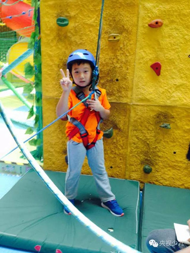 庫建鈞，9歲。攀岩運動。