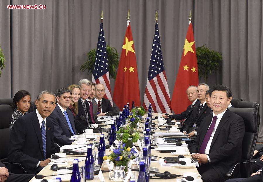 Chinese President Xi Jinping (1st R) meets with his U.S. counterpart Barack Obama (1st L) on the sidelines of the fourth Nuclear Security Summit in Washington D.C., the United States, March 31, 2016. (Xinhua/Xie Huanchi)