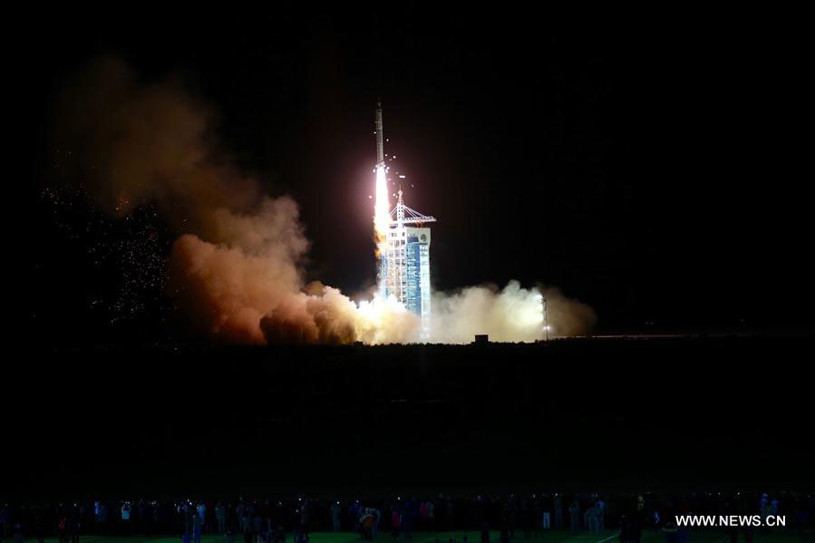 A Long March 2-D rocket carrying the SJ-10 Satellite blasts off at the Jiuquan Satellite Launch Center in Jiuquan, northwest China