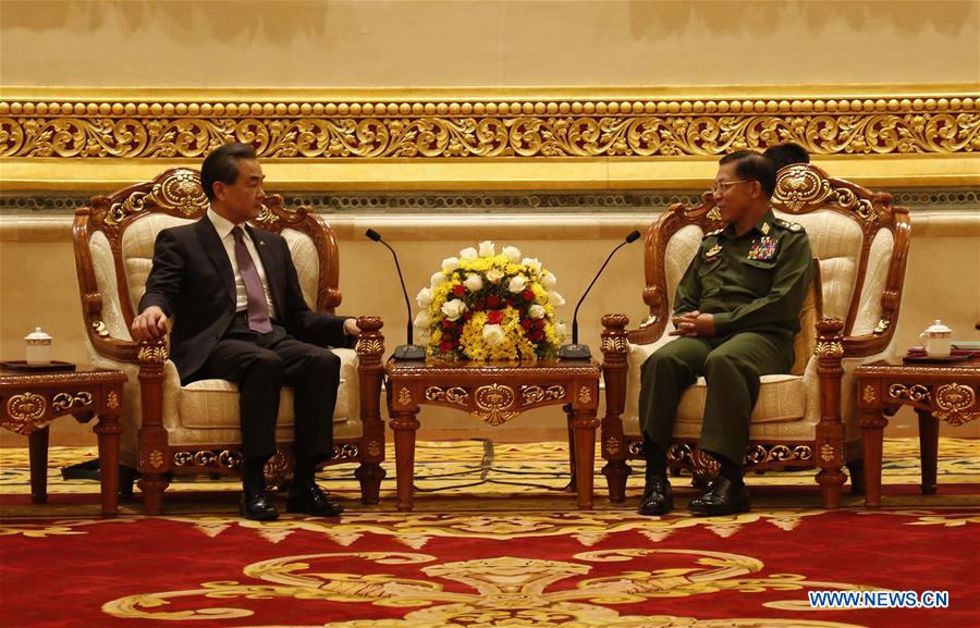 Chinese Foreign Minister Wang Yi (L) meets with Commander-in-Chief of Myanmar