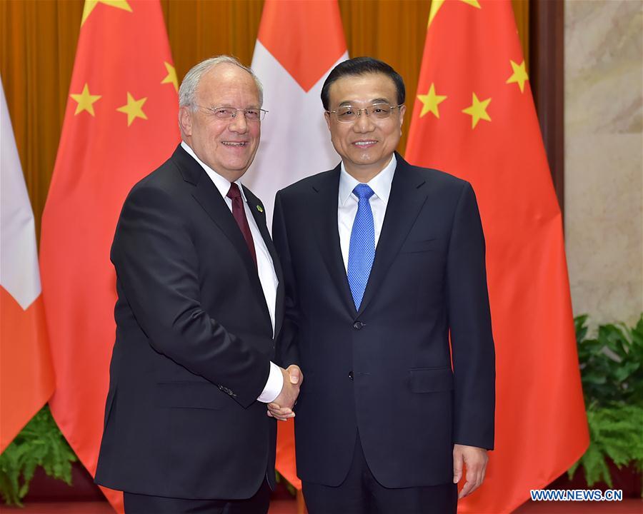 Chinese Premier Li Keqiang meets with Swiss President Johann Schneider-Ammann in Beijing, China, April 7, 2016. (Xinhua/Li Tao)