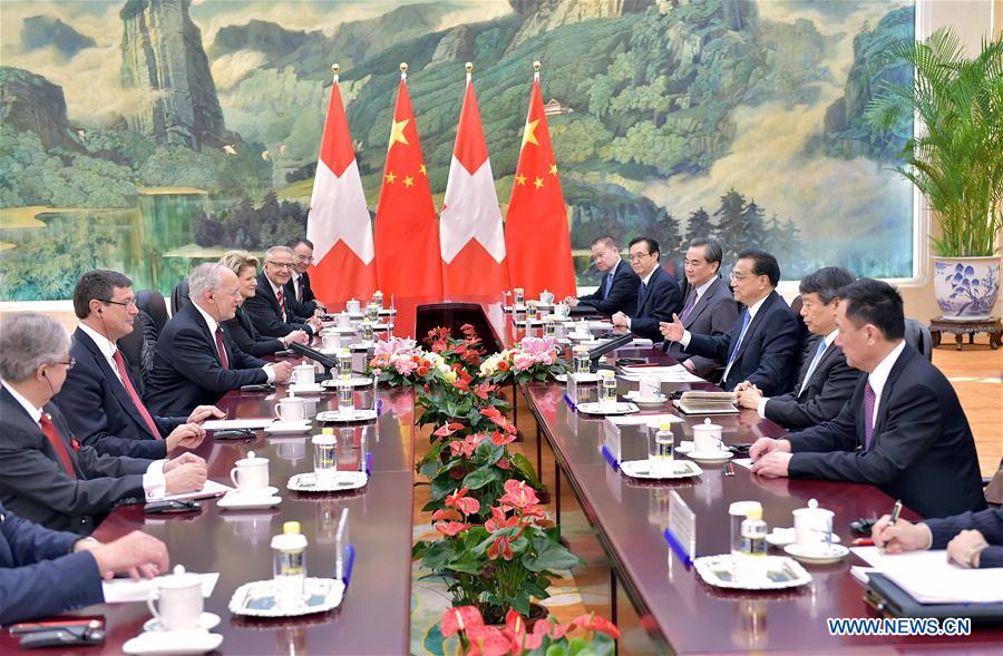 Chinese Premier Li Keqiang meets with Swiss President Johann Schneider-Ammann in Beijing, China, April 7, 2016. (Xinhua/Li Tao)