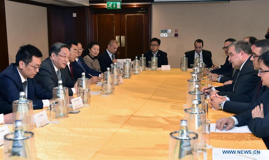 Yu Zhengsheng (2nd L), chairman of the National Committee of the Chinese People