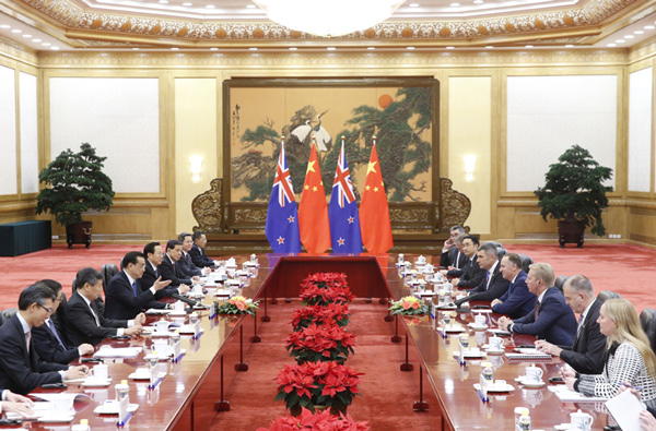 Chinese Premier Li Keqiang has held a welcome ceremony for visiting New Zealand Prime Minister John Key at the Great Hall of the People in Beijing.