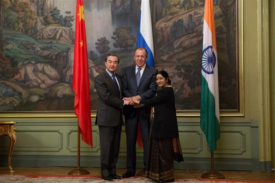 MOSCOW, April 18, 2016 (Xinhua) -- Chinese Foreign Minister Wang Yi (L), Russian Foreign Minister Sergey Lavrov (C) and Indian External Affairs Minister Sushma Swaraj attend the 14th Meeting of the Foreign Ministers of China, Russia and India, in Moscow, capital of Russia, on April 18, 2016. (Xinhua/Bai Xueqi)