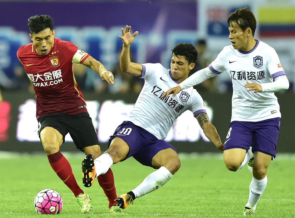 Guangzhou Evergrande routs Tianjin 4-0 to top Chinese Super League