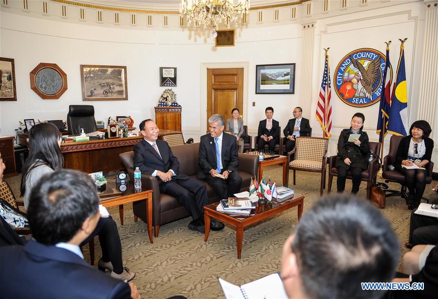 DENVER, April 23, 2016 (Xinhua) -- Chaizhalha(L Center), secretary of the Lhasa Municipal Committee of the Communist Party of China, meets with Vice Mayor of Denver Don Mares (R Center) in Denver of Colorado State, the United States, April 21, 2016. Chaizhalha was leading a delegation of Tibet Autonomous Region of the Chinese National People