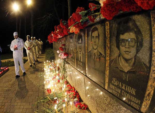 In the town of Slavutych, where people were evacuated following the accident, people laid flowers, and lit up candles. 