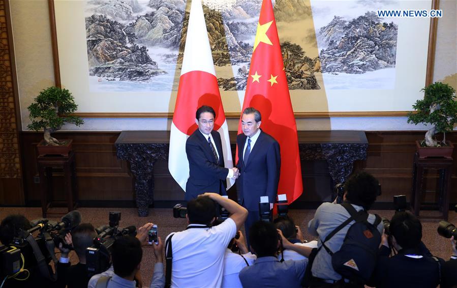 BEIJING, April 30, 2016 (Xinhua) -- Chinese Foreign Minister Wang Yi (R) holds talks with Japanese Foreign Minister Fumio Kishida in Beijing, capital of China, April 30, 2016. (Xinhua/Yao Dawei)