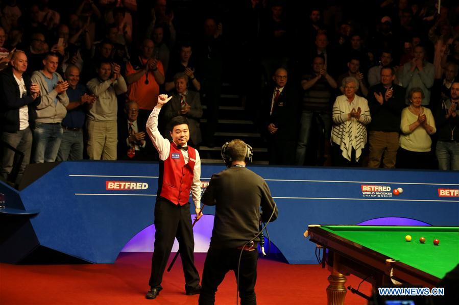 SHEFFIELD, May 1, 2016 (Xinhua) -- Ding Junhui of China celebrates after the semifinal match against Alan McManus of Scotland at the World Snooker Championship 2016 at the Crucible Theatre in Sheffield, England on April 30, 2016. Ding became the first Chinese finalist in the World Championship history after defeating Alan McManus 17-11. (Xinhua/Han Yan)