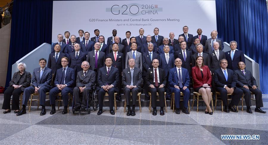 WASHINGTON D.C., April 15, 2016 (Xinhua) -- Finance ministers and central bankers of the G20 pose for a family photo after G20 meeting during the IMF and World Bank spring meetings in Washington D.C., capital of the United States, April 15, 2016.(Xinhua file photo/Yin Bogu)