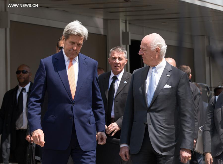  U.S. Secretary of State John Kerry (L, front) and UN Special Envoy for Syria Staffan de Mistura (R, front) arrive for a press conference after their meeting in a hotel in Geneva, Switzerland, May 2, 2016. U.S. Secretary of State John Kerry on Monday urged all parties to the Syrian conflict to end violence and restore the cessation of hostilities during his second day trip here for talks focusing on the Syrian situation. (Xinhua/Xu Jinquan)