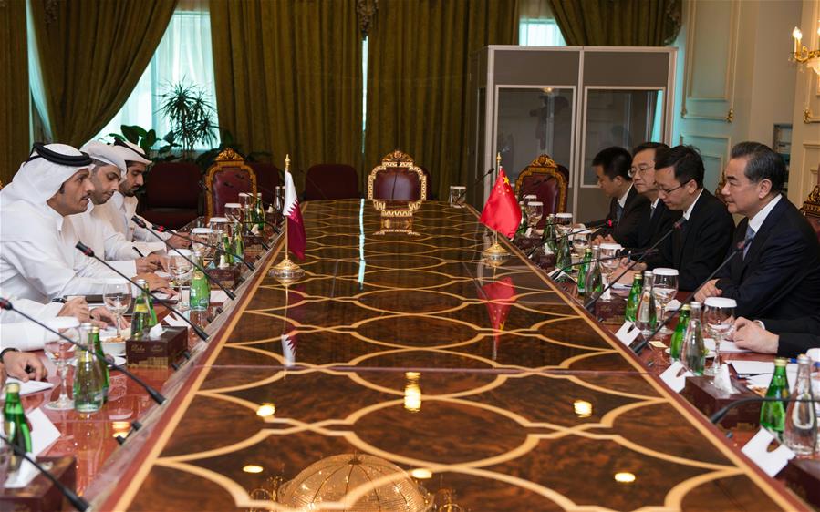 Chinese Foreign Minister Wang Yi (1st R) holds talks with Qatari Foreign Minister Sheikh Mohammed bin Abdulrahman bin Jassim Al-Thani (1st L) in Doha, Qatar, May 11, 2016. (Xinhua/Meng Tao) 