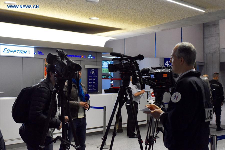 PARIS, May 19, 2016 (Xinhua) -- A policeman registers reporters at the counter of EgyptAir in Paris Charles de Gaulle Airport, France, May 19, 2016. A crisis center was set up early Thursday morning at Terminal 1 of Paris Charles de Gaulle airport for the missing EgyptAir MS804 flight, French media reported. The flight, an Airbus 320, disappeared from radar en route from Paris to Cairo early Thursday, the Egyptian airline confirmed. (Xinhua/Li Genxing)